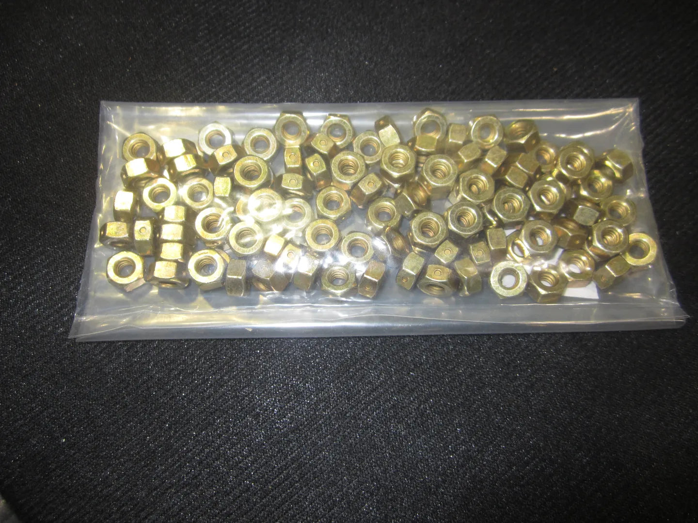 JLG Nut Hex10 24 Lockqty100 3311005 100 replacement part image